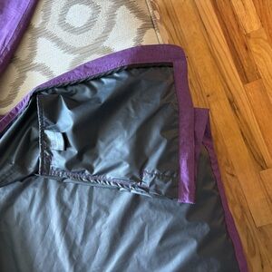Slightly used lightweight jacket with accompanying pouch for storage